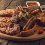 International BBQ meats highlighting global grilling in Chicago’s summer dining