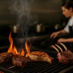 chefs grilling assorted beef pork and lamb cuts over open wood fire