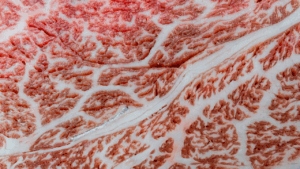 Close up of A5 certified Japanese Wagyu beef showing exceptional marbling and texture