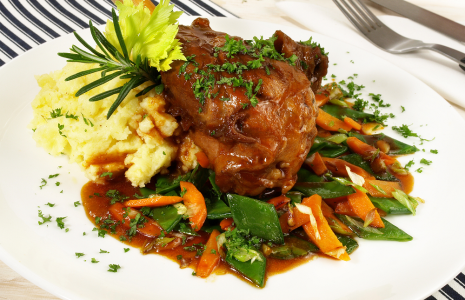 Chef preparing a holiday lamb dish - Lamb Menu Ideas for Holidays
