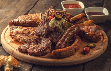 International BBQ meats highlighting global grilling in Chicago’s summer dining